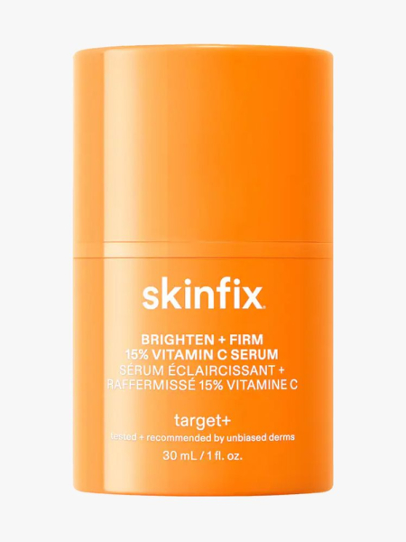 Skinfix Brighten + Firm 15% Vitamin C in branded component on a light gray background